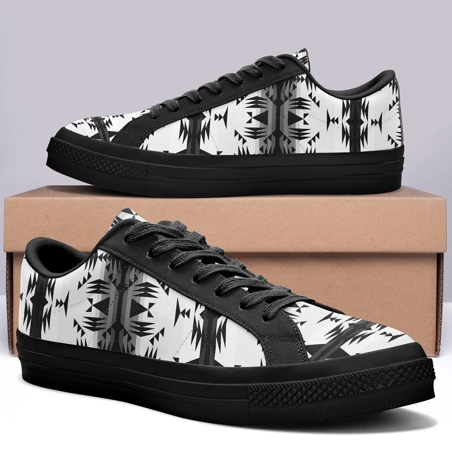 Between the Mountains White and Black Aapisi Low Top Canvas Shoes Black Sole